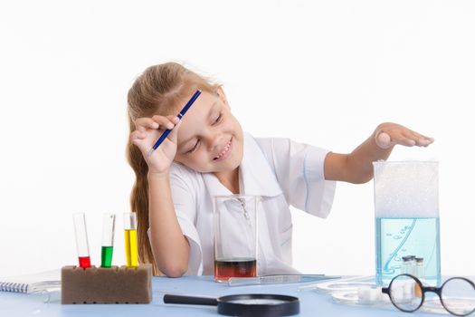 Pupil at a school desk in chemistry class