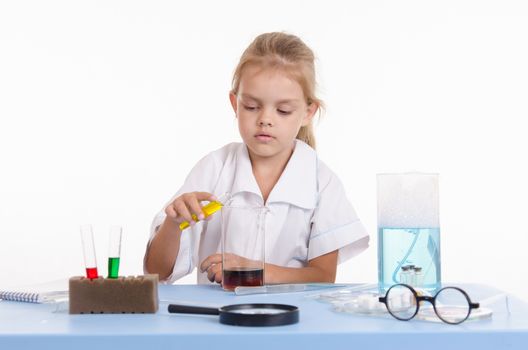 Pupil at a school desk in chemistry class