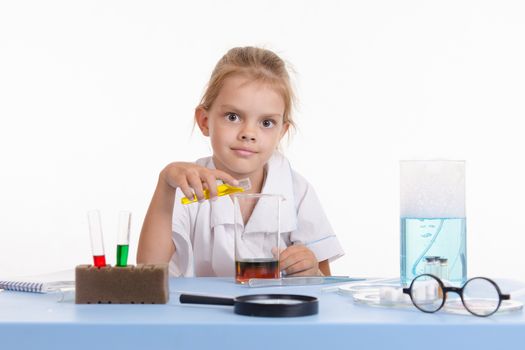 Pupil at a school desk in chemistry class