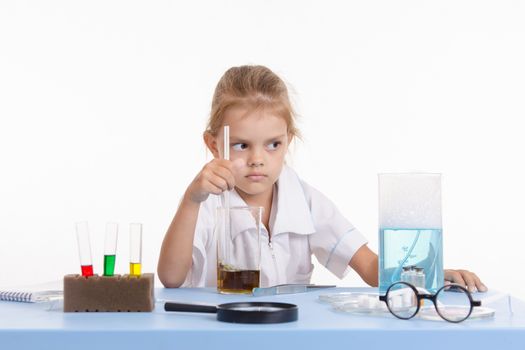 Pupil at a school desk in chemistry class