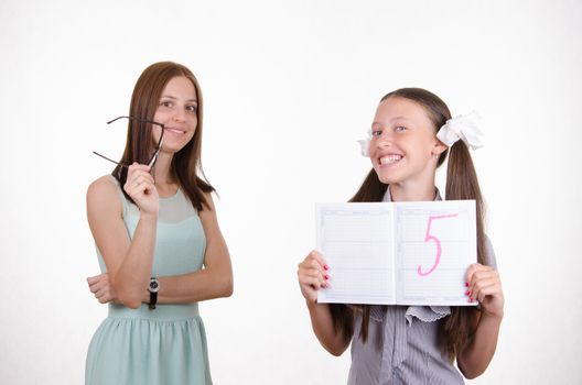 The teacher put five good a student