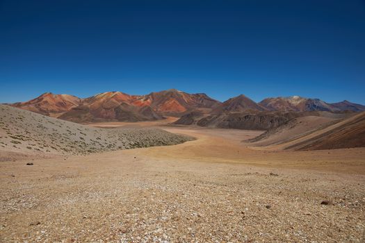 Colourful mountain landscape at Suriplaza in the Atacama Desert of north east Chile. The altitude is in excess of 4,000 metres.