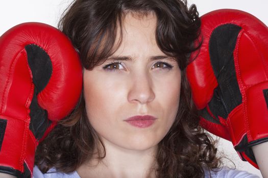 sport - young woman with red boxing gloves