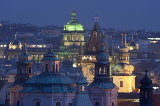 czech republic, prague - towers of the old town and national musem at dusk