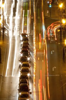 prague - high angle view of traffic on cechuv bridge at dusk