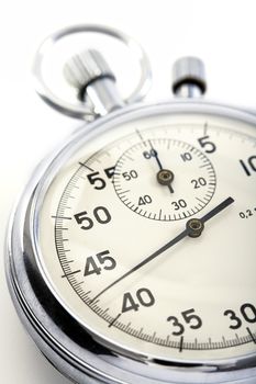 closeup o a stopwatch isolated on white background