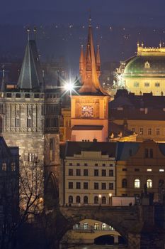 czech republic, prague - towers of the old town and national theatre at dusk