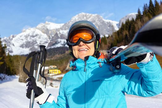 Ski, skier, winter - Closeup of smiling senior skier woman.
