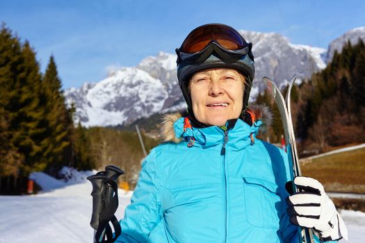 Ski, skier, winter - Closeup of smiling senior skier woman.