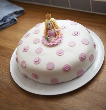 Close up of Pink Birthday Cake with a princess