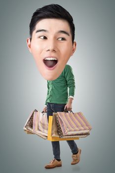 Funny shopping Asian guy, full length portrait.