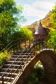 View of the bridge before the ancient Armenian Geghard temple complex