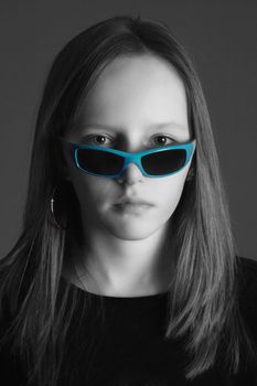 studio portrait of a pretty, eleven years old girl