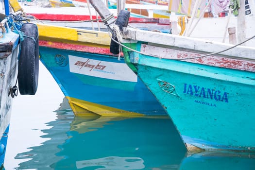 TANGALLE, SOUTHERN PROVINCE, SRI LANKA, ASIA - DECEMBER 20, 2014: Colorful wood fishing boats moored on December 20, 2014 in Tangalle port, Southern Province, Sri Lanka.