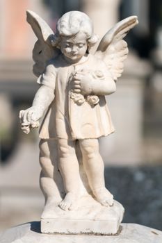 ornamental statuette for the graves of the cemetery