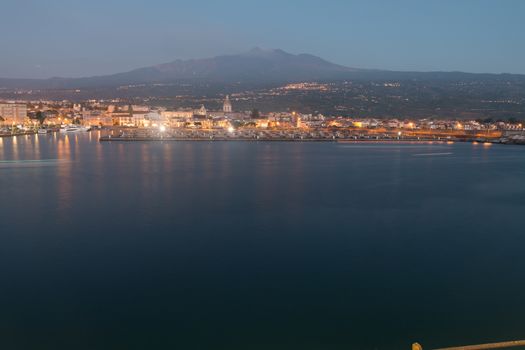 Volcano Etna photographed from Riposto before dawn