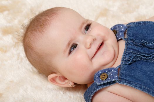 smiling infant baby - the first year of the new life