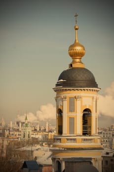 Moscow, Russia, Dome, Spire and Bell tower of the Orthodox Temple in Zamoskvorechie at Solar Day, instagram image style