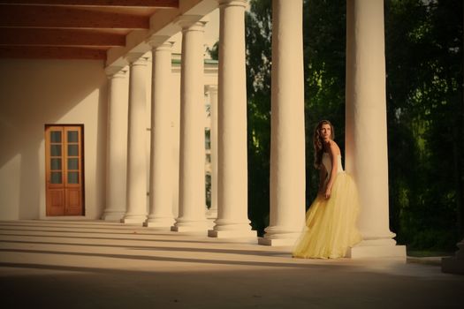 gorgeous bride amongst colonnades of the old-time building, instagram image style