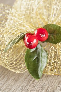 Christmas decoration in close up, over wooden background