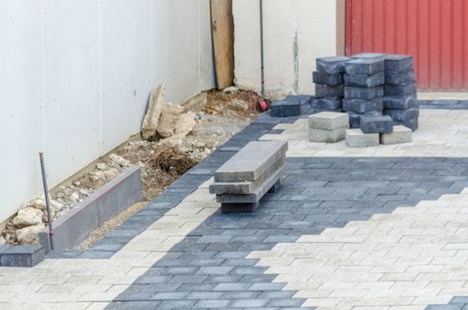 Detail, embarrassed of pavement on a driveway.