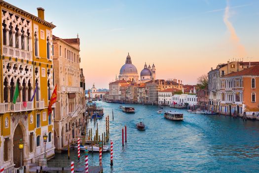 Gorgeous view of the Grand Canal and Basilica Santa Maria della Salute during sunset, Venice, Italy. 