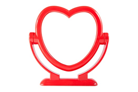 Mirror in the red heart frame isolated on white background