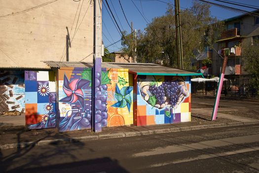 Colourful murals adorning the walls of tenement blocks in the San Miguel area of Santiago, capital of Chile. The area was created as an open air museum in what was a run down area of the city.