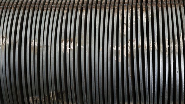 Close-up of steel parts for screw conveyors at an early production stage.