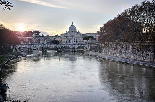 Saint Peter's Cathedral in Vatican City seen from the river Tiber at sunset