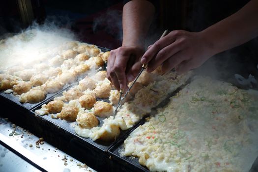 The making of Takoyaki in Osaka, Japan