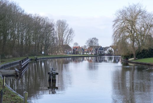 village Ossenzijl in holland near the water in autumn