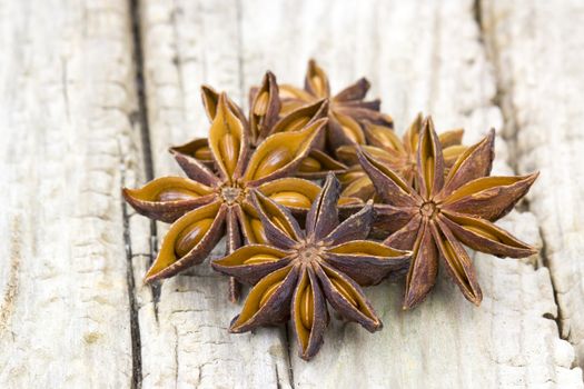 star anise on wooden background