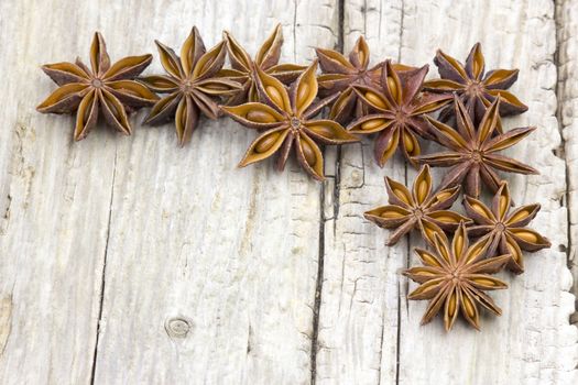 star anise on wooden background