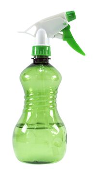 Green plastic spray bottle isolated on white background