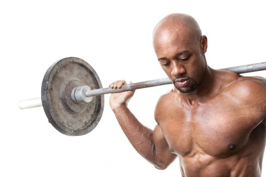 Toned and ripped lean muscle fitness man lifting weights isolated over a white background.