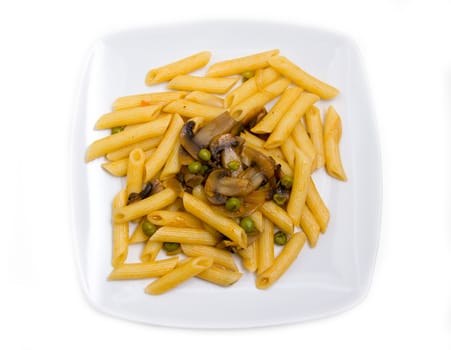 Pasta with mushrooms and peas on white background top view