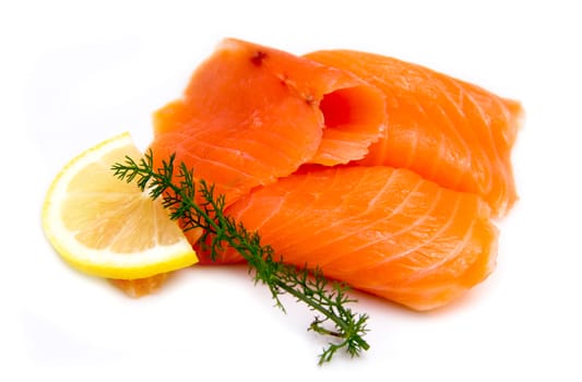 Smoked salmon seen up close on a white background