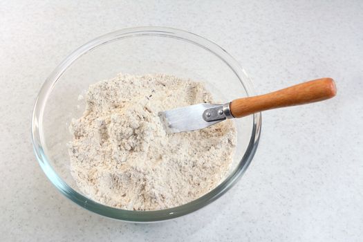 Mixing bread flour mix and rubbed in butter with a palette knife