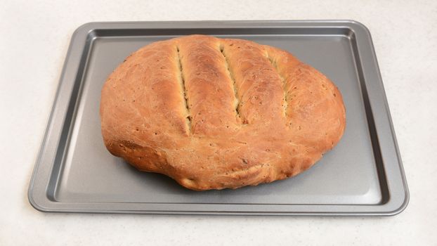 Freshly-baked multi seed malted bread, hot from the oven