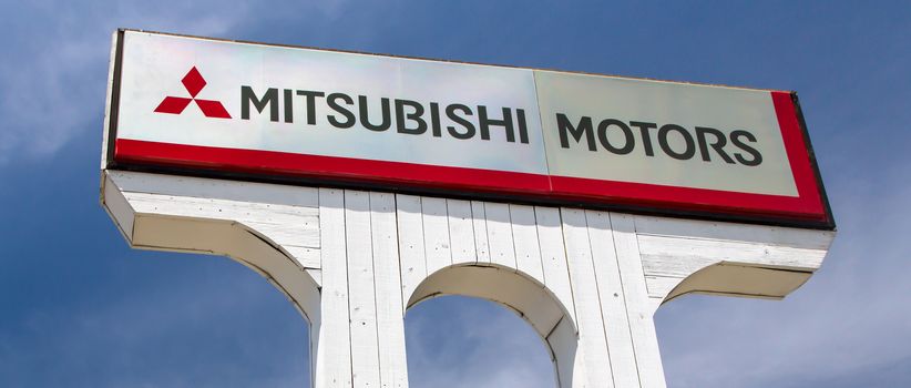 SAN JOSE,CA/USA - MAY 24, 2014: Mitsubishi Motors Autombile Dealership Sign. Mitsubishi is a Japanese manufacturer of automobiles and commercial vehicles.