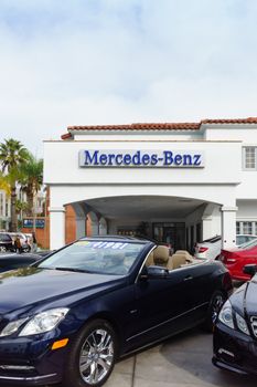 SANTA MONICA, CA/USA - DECEMBER 10, 2014:  Mercedes-Benz automobile dealership.  Mercedes is a German automobile manufacturer, a multinational division of the German manufacturer Daimler AG.