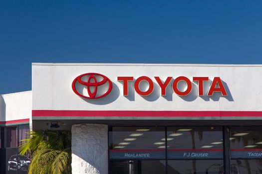 CULVER CITY, CA/USA - NOVEMBER 29, 2014: Toyota automobile dealership sign. Toyota is a multi-national Japanese automotive manufacturer.