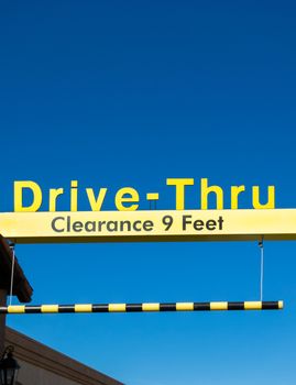 SAND CITY, CA/USA - NOVEMBER 17, 2014: McDonald's Drive-Thru sign. The McDonald's Corporation is the world's largest chain of hamburger fast food restaurants.