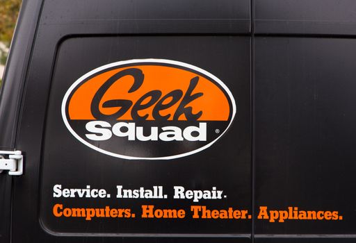 SAN SIMEON, CA/USA - SEPTEMBER 21, 2014: Geek Squad logo on vehicle. The Geek Squad offers various computer-related services and accessories for residential and commercial clients.