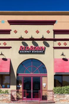 VALENCIA, CA/USA - AUGUST 17, 2014. Red Robbin Gourmet Burger restaurant exterior. Red Robin is a chain of casual dining restaurants founded in 1969 in Seattle, Washington.