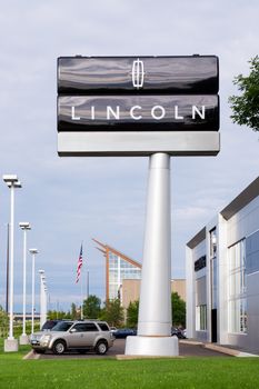 BLOOMINGTON, MN/USA - JUNE 22, 2014: Lincoln automobile dealership exterior. Lincoln is a division of the Ford Motor Company that sells luxury vehicles under the Lincoln brand.