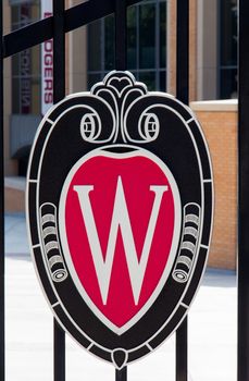 MADISON, WI/USA - JUNE 26, 2014: University of Wisconsin logo at Camp Randall. The University of Wisconsin is a Big Ten University in the United States.