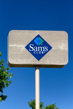 BLOOMINGTON, MN/USA - JUNE 21, 2014: Sam's Club exterior sign. Sam's Club is an American chain of membership-only retail warehouse clubs owned and operated by Walmart.