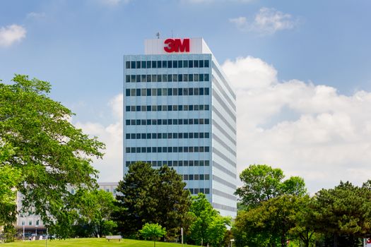 MAPLEWOOD, MN/USA - JUNE 20, 2014: 3M corporate headquarters building. 3M is a worldwide manufacturer of industrial and consumer products and employes 88,000 people worldwide.